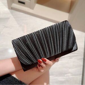 Woman’s shimmery clutch